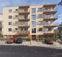 Apartment building on Okružná Street in Veľký Krtíš with parking spaces.