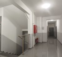 Hallway with elevator and staircase, Okružná Street, Veľký Krtíš, near a 2-room apartment.