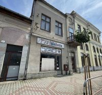 Commercial premises in the town of Šahy on the Main Square, exterior of a historic building.