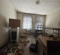 Unfurnished commercial spaces with cardboard boxes and metal furniture.