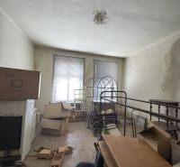 Disorder with cardboard boxes in the commercial premises on the Main Square in Šahy.