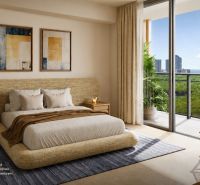Bedroom in a studio apartment with access to a balcony, bright walls, plants, and decorative paintings.