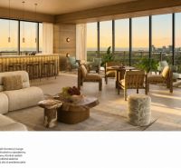 Luxury lounge with wooden decor, comfortable seating, and panoramic view in a studio apartment.