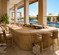 Outdoor bar by the pool with seating, loungers, and greenery in a studio apartment.