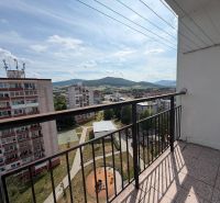 A view from the balcony of a 3-room apartment in Detva to the panorama of the city and the surrounding mountains.