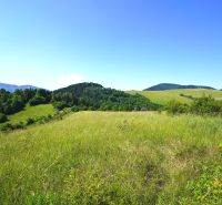Green hills and meadows around the recreational plots in Lysice.