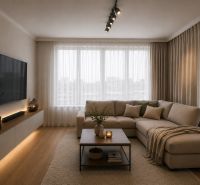 Living room in a two-room apartment with a comfortable sofa set and a wooden decor floor.