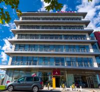 Office building at Galvaniho 15/A in Bratislava - Trnávka with a glass facade and balconies.