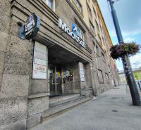 Offices on Štefánikova Street in Bratislava - Old Town, entrance area, logo on the facade.