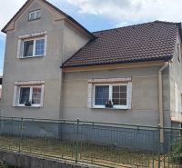 A family house on Hoštáky Street in Dojč with windows and a gable roof.