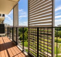 A balcony with a view of greenery and surroundings from a 3-room apartment, Bratislava - Petržalka, Rusovská cesta.