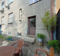 The exterior of the building with furniture in front of a 4-room apartment on Daniela Dlabača in Žilina.