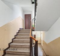The staircase leads to the door in an apartment building on Gazdovský Rad in Šamorín.