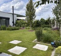A family house on Rizlingova Street in Trenčín with a landscaped garden and lawn.