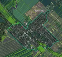Aerial view of Bátorove Kosihy, Residential plots, with green fields surrounding the village.