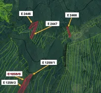 Aerial view of agricultural and forest lands around Čadca with marked parcels.