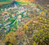 Aerial view of a picturesque village near Muľa, an ideal place for land - living.