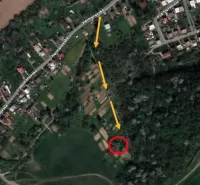 Aerial view of gardens in Bystré with a marked path.