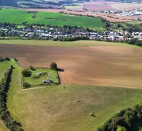 Aerial view of agricultural and forest lands around Trenčianske Stankovce.