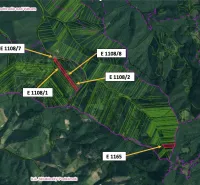 Aerial view of agricultural and forest lands in Podhradie with marked parcels.