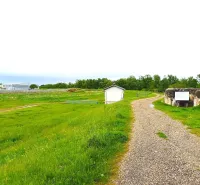 Unique properties in the town of Malacky, including a bunker and a building in a green environment.