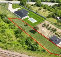 Aerial view of plots - housing in Nové Mesto nad Váhom, marked with a red line.
