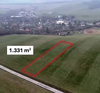 Aerial view of a plot in Podkylava marked as parcel 1,331 m², surrounded by nature.