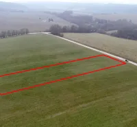The landscape in Podkylava with a designated plot for special properties on the plain.