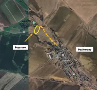 Aerial view of agricultural and forest lands around Podhorany.