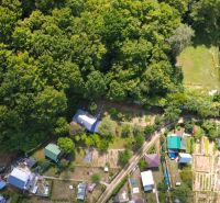 An aerial view of the arrangement of gardens near the forest by the town of Zvolen.