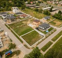 Aerial view of properties - housing in Brezno, Štvrť kasárne, surrounded by development and nature.