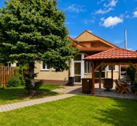 A family house on Hrnčiarska Street in Sereď with a gazebo and a well-maintained garden.