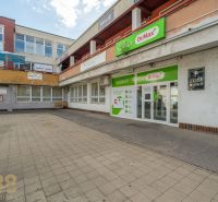 Building in Banská Bystrica with Dr.Max pharmacy and surrounding establishments.