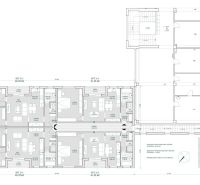 Floor plan of apartments and offices in the building; it shows the arrangement of rooms and parking.