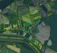 Aerial photograph of agricultural and forest lands in the Komárno area with river areas.