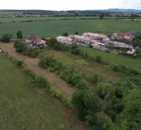 Plots - living in Rakytník surrounded by fields and rural environment, formed by greenery and trees.