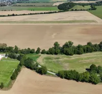 Aerial view of agricultural and forest lands near Nová Ves nad Váhom.