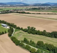 Aerial view of agricultural and forest land in Nová Ves nad Váhom.