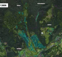 Map of agricultural and forest land around Brusno with marked parcel data.