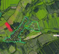 Aerial view of agricultural and forest lands around Dúbravica, highlighted boundaries and colors.