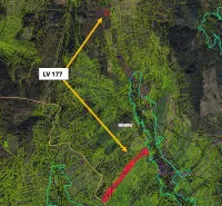 Meadows, agricultural and forest lands with a marked route on the map background.