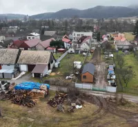 Unusual properties in Kláštor pod Znievom with visible wooden shelters and gardens.