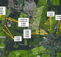 An aerial map shows agricultural and forest lands around the town of Stupava.