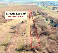 Aerial view of extensive gardens in Štúrovo, bordered by a red line.