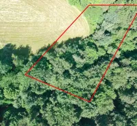 Aerial view of agricultural and forest lands in Lysá pod Makytou surrounded by greenery.