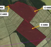 Aerial photograph of agricultural and forest lands in Trhovištia with marked parcels.