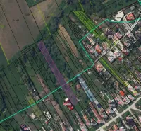 Aerial view of gardens in the town of Branč with marked plots.