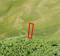 Aerial view of agricultural and forest lands around Kozárovce.