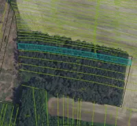 Aerial view of agricultural and forest land in Lozorno, with highlighted parcel boundaries.