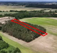 Agricultural and forest land in Lozorno with dense vegetation and forest stands.